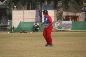 Cricket fielder making a quick and accurate stop to save runs