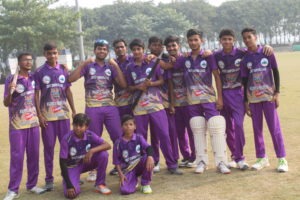 A confident cricket team standing together on the field